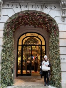 Jennifer holds Emmy in front of Ralph Lauren in New York City